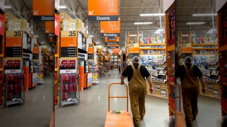 person walking through Home Depot