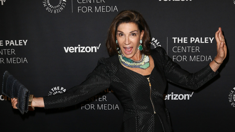 Hilary Farr posing and grinning at an event