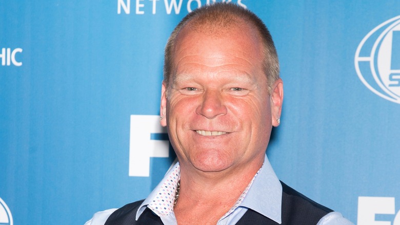 HGTV's Mike Holmes smiling during event