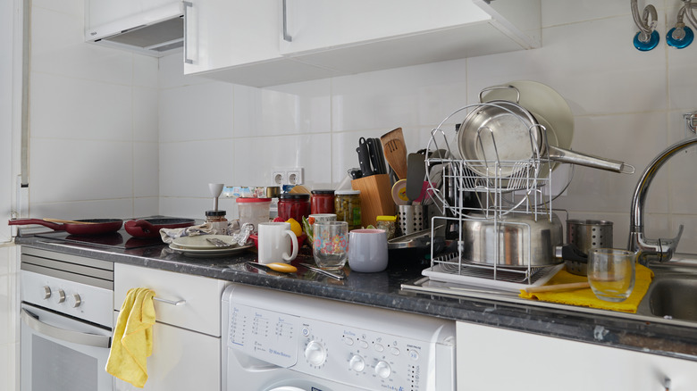 messy crowded kitchen countertop