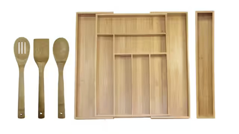 A bamboo utensil set paired with an expandable drawer organizer