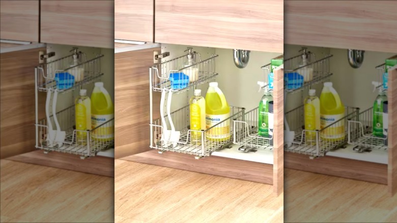 A two-tier silver organizer with one pull-out drawer