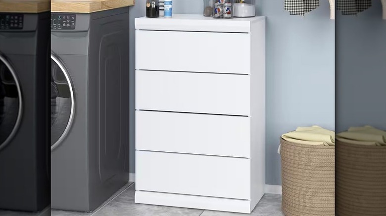 A ClosetMaid Mosaics Organizer Wood Closet System in a laundry room