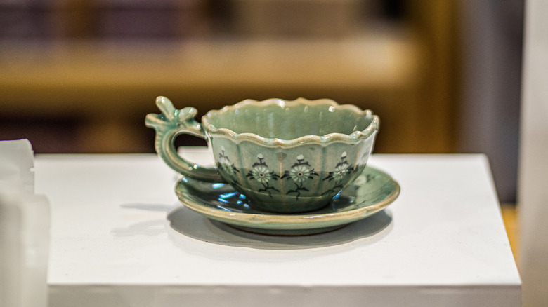 Image of inlaid Korean celadon coffee cup and saucer.
