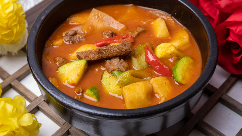Potato and red pepper paste stew in a Ttukbaegi pot.