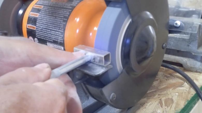 A bench grinder having its wheels dressed