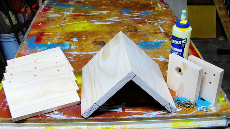 The pieces required to build a birdhouse