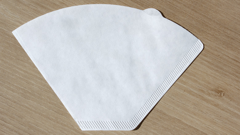 A coffee filter laying flat on a table