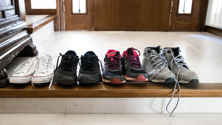 shoes sitting by the entry door