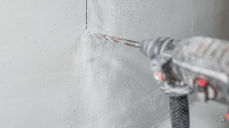 Drilling into concrete with a hammer drill