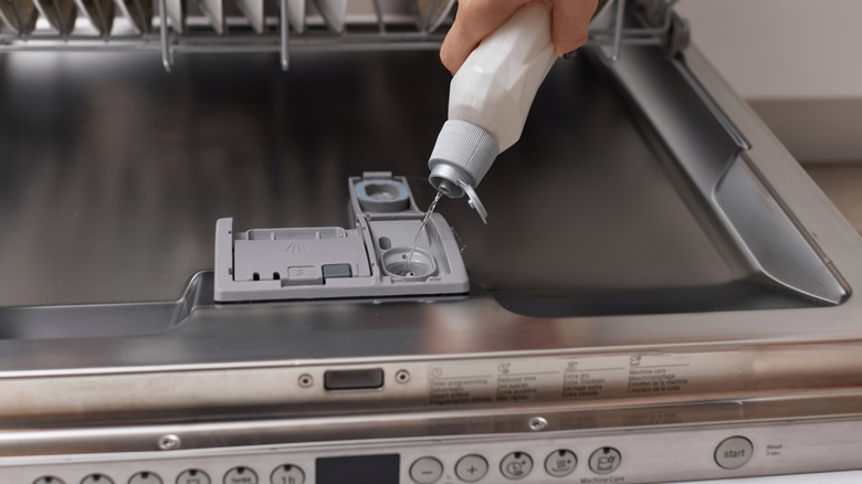 Adding rinse aid to a dishwasher