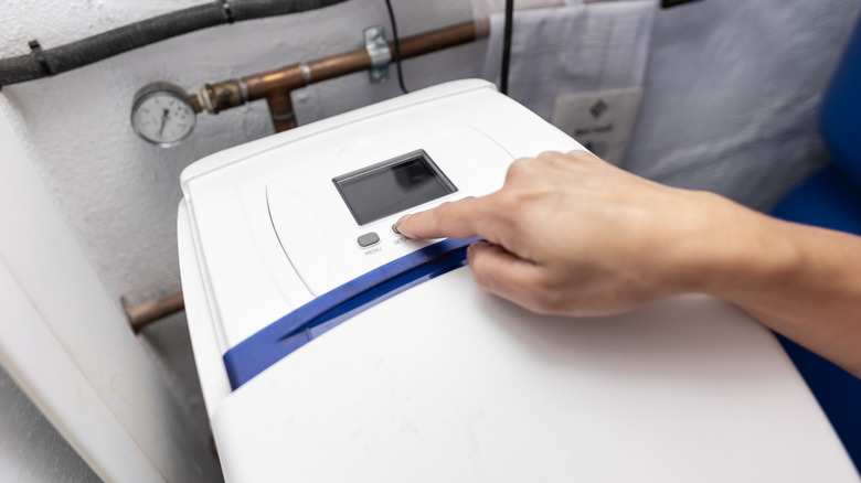 Adjusting settings on whole-house water softener