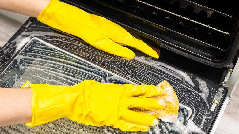 Scrubbing an oven door