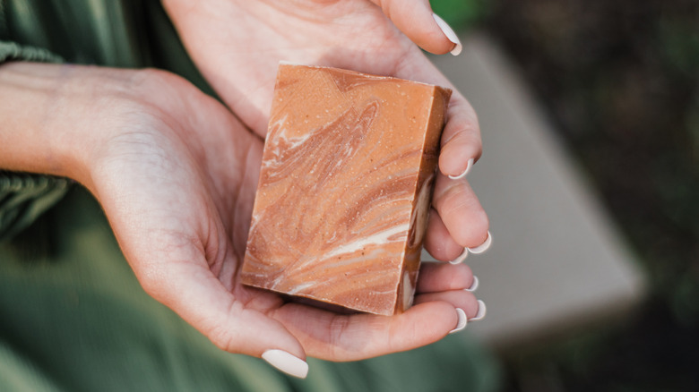 Woman holding soap