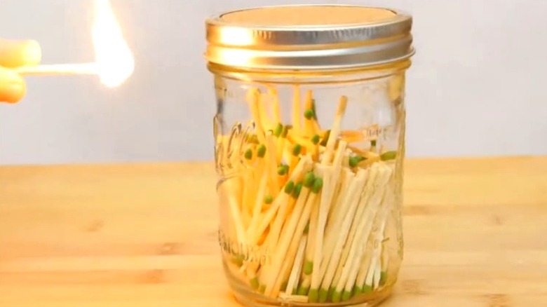 Adding sandpaper lid to a Mason jar full of matches