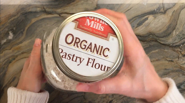 Using packaging label under Mason jar ring