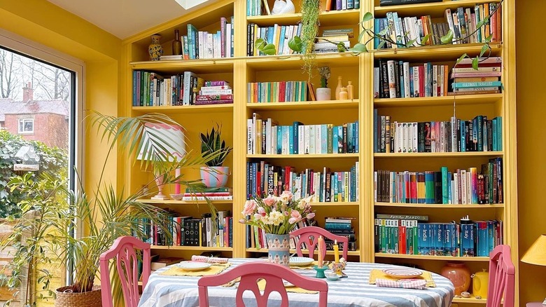 Bright yellow painted BILLY bookcases