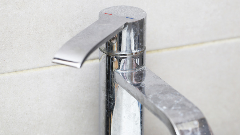 sink faucet with water stains