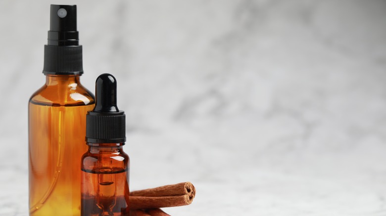 spray bottle of cinnamon oil