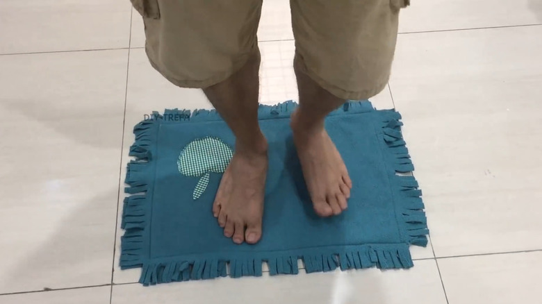 Bath mat made from an old blanket