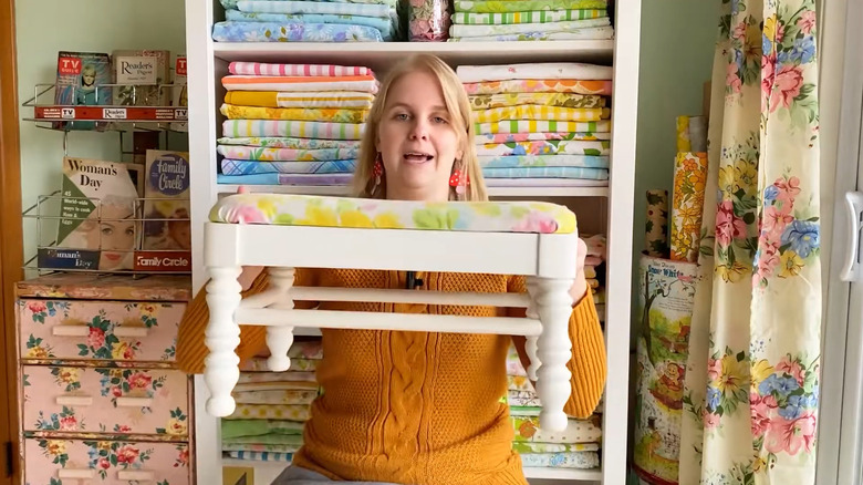Footstool reupholstered with old bedding