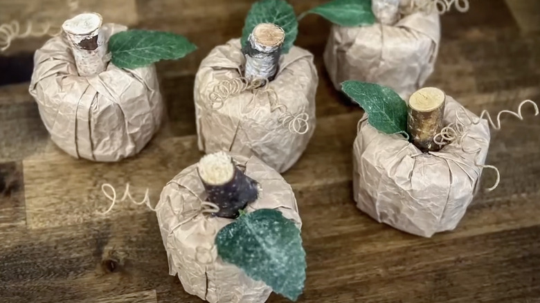 Rustic DIY small pumpkins made from pool noodles and brown paper bags