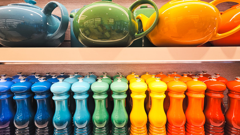Colorful Le Creuset teapots and salt and pepper shakers