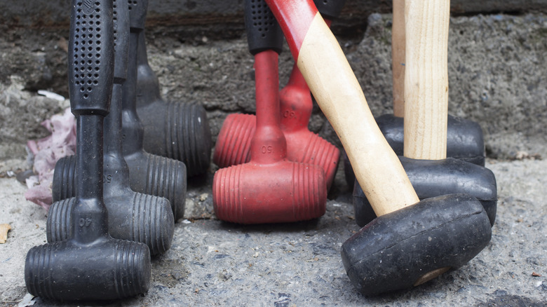 A selection of dead blow hammers and  mallets