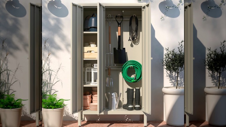 KOLBJÖRN cabinet storing garden tools and supplies