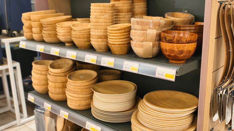 IKEA bamboo bowls organized on display shelf in store