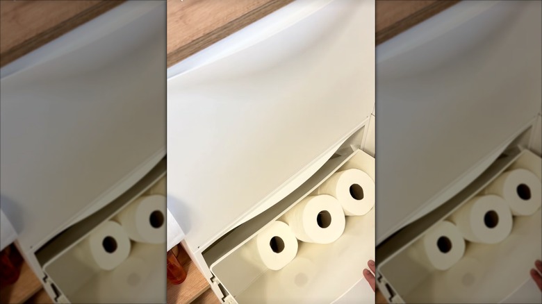 IKEA TRONES cabinet in bathroom with toilet paper inside