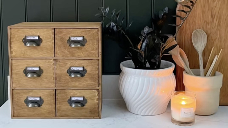 IKEA MOPPE mini storage chest turned into a vintage-inspired apothecary style tea chest
