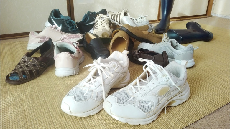 pile of shoe clutter on the floor