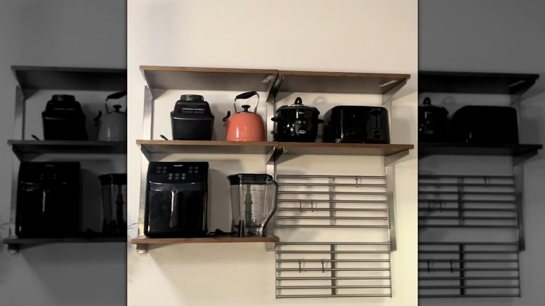 KUNGSFORS shelving system from IKEA filled with kitchen appliances