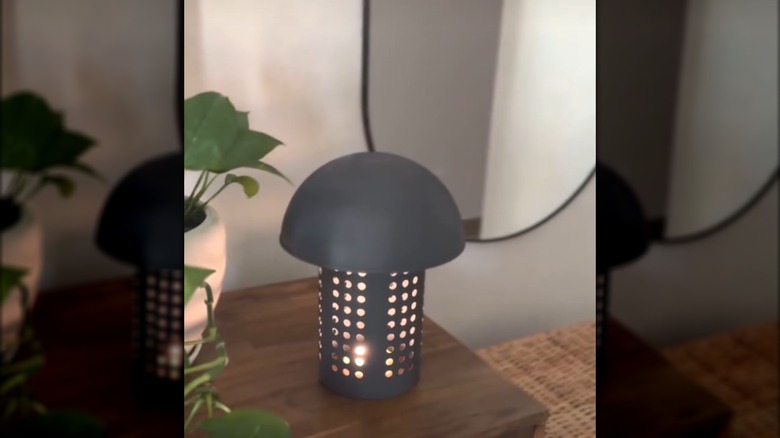 DIY lamp made from an IKEA utensil holder and bowl spray painted black