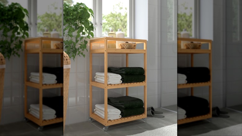IKEA RÅGRUND cart holding towels in bathroom