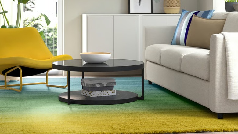 A thick, tri-color rug in a living room