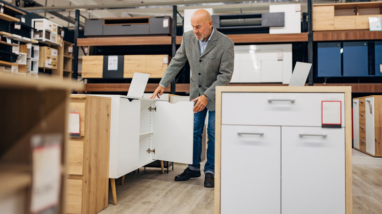person shopping for storage cabinet