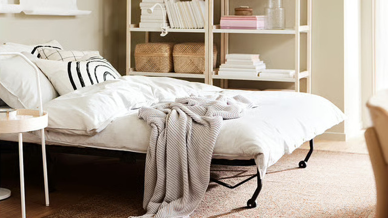 IKEA LYCKSELE LÖVÅS sleeper sofa opened up into a full bed