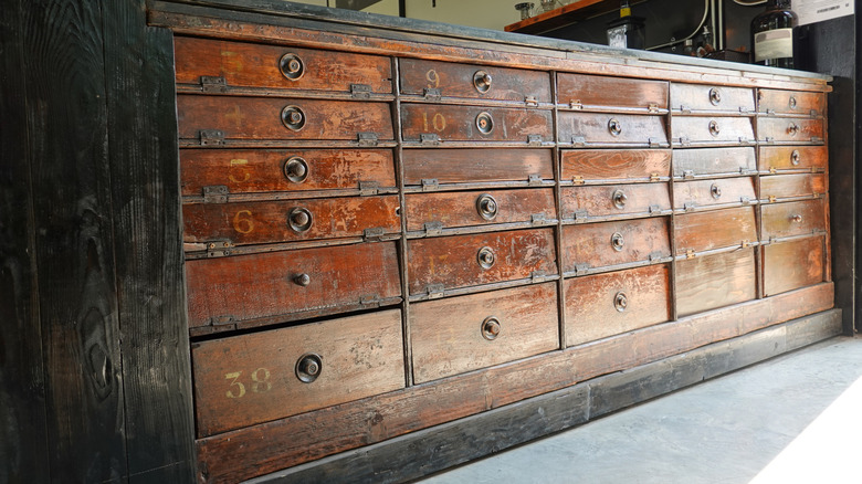 old wooden chest of drawers that could be used as an island