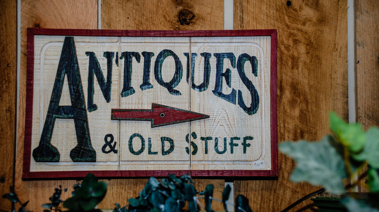 Whimsical antiques sign