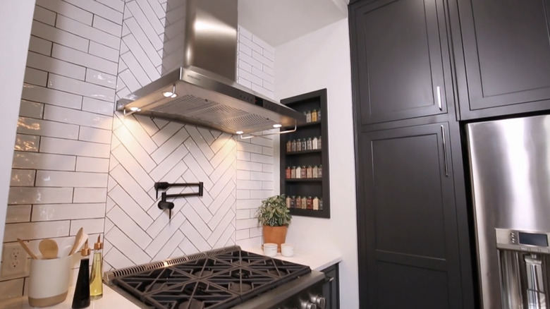 Kitchen with mixed subway tile backsplash