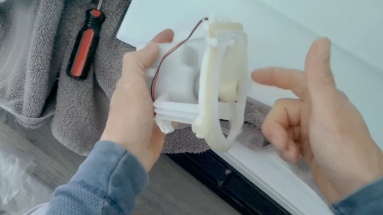 Testing an evaporator fan removed from a Kenmore refrigerator