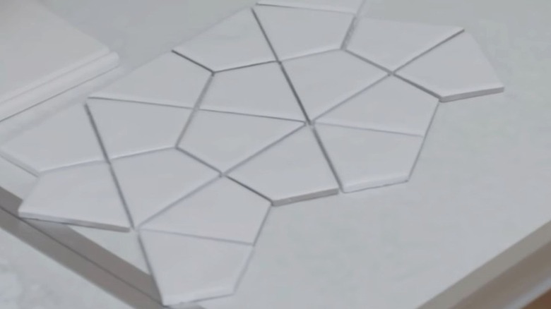 A closeup of a diamond tile backsplash sample