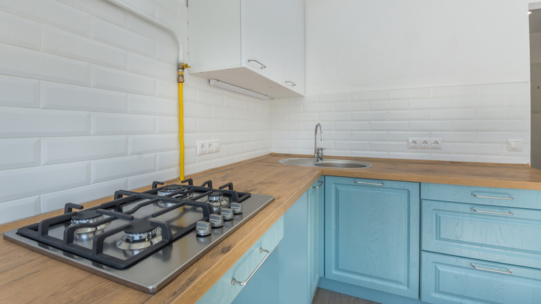 kitchen with laminate faux butcher block countertops