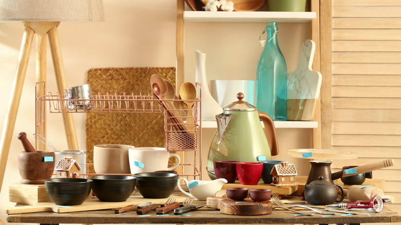 Various kitchenware on a wood surface