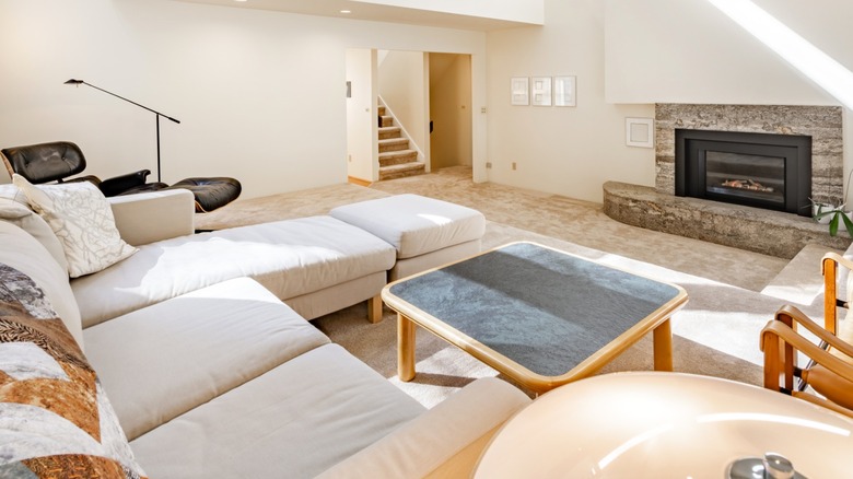 Carpeted mid-century living room with sunken section