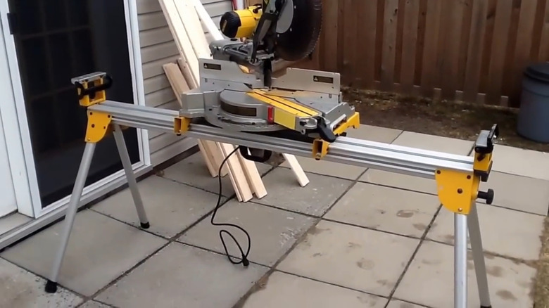 A Dewalt adjustable aluminum miter saw stand.