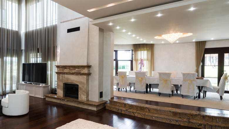 Utilitech color choice 850-lumen dimmable canless LEDs in the ceiling of a luxurious room.