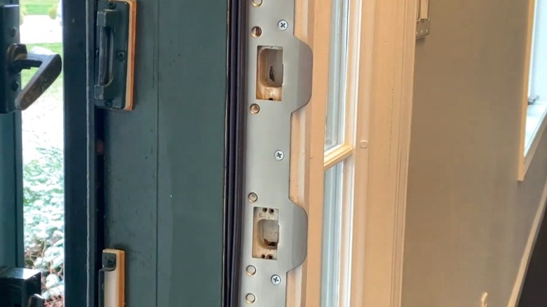 Security strike plate on a home's exterior door to prevent break-ins